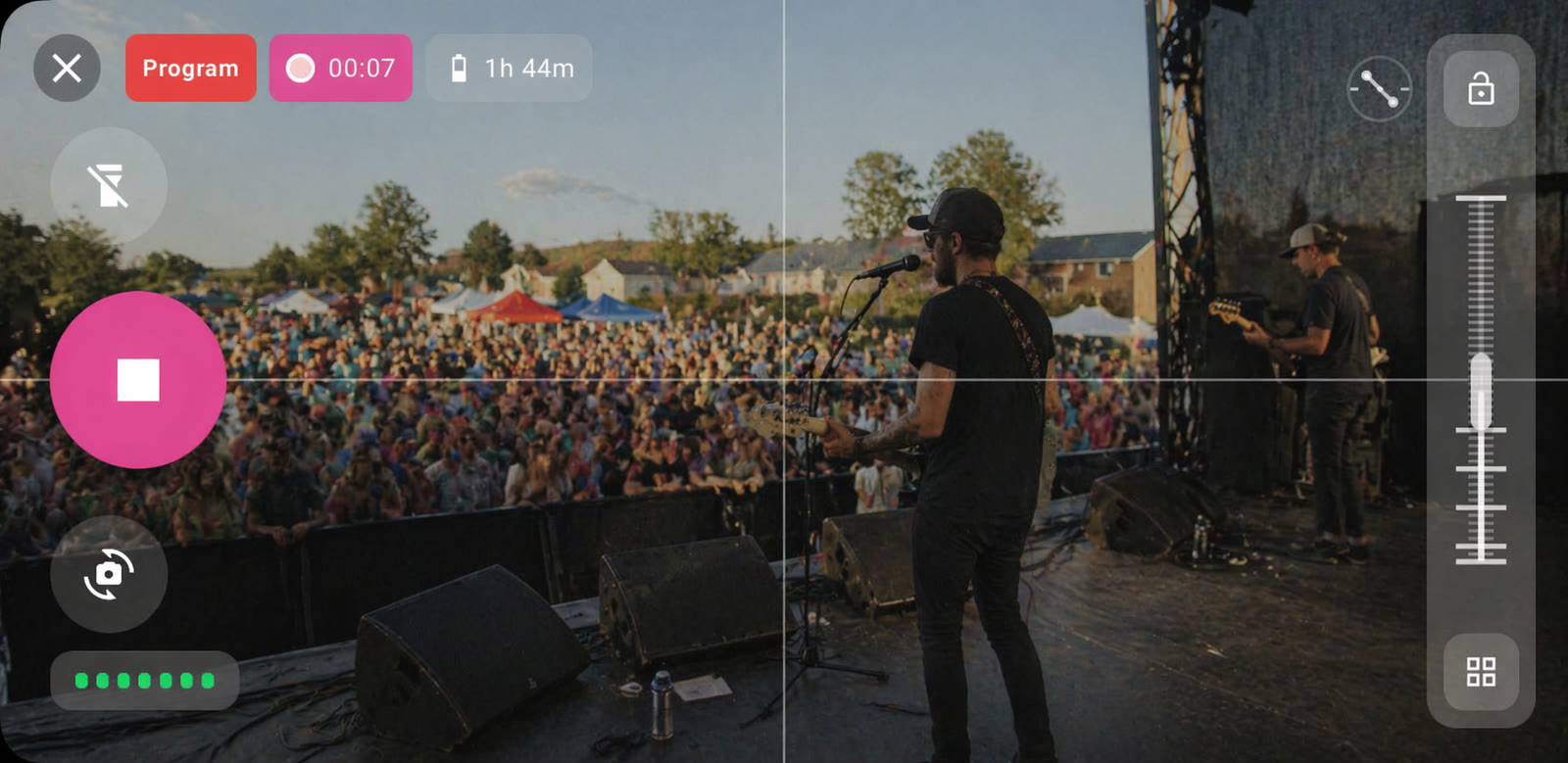 PRISMUX camera operator interface — preview feed, record timer, zoom wheel, signal indicators